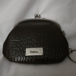 Women's brown faux snake skin coin purse/wallet.